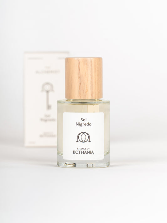 Bottle of Sol Nigredo by Bothania on a white background
