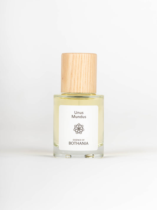 Clear perfume bottle with wooden top named Unus Mundus