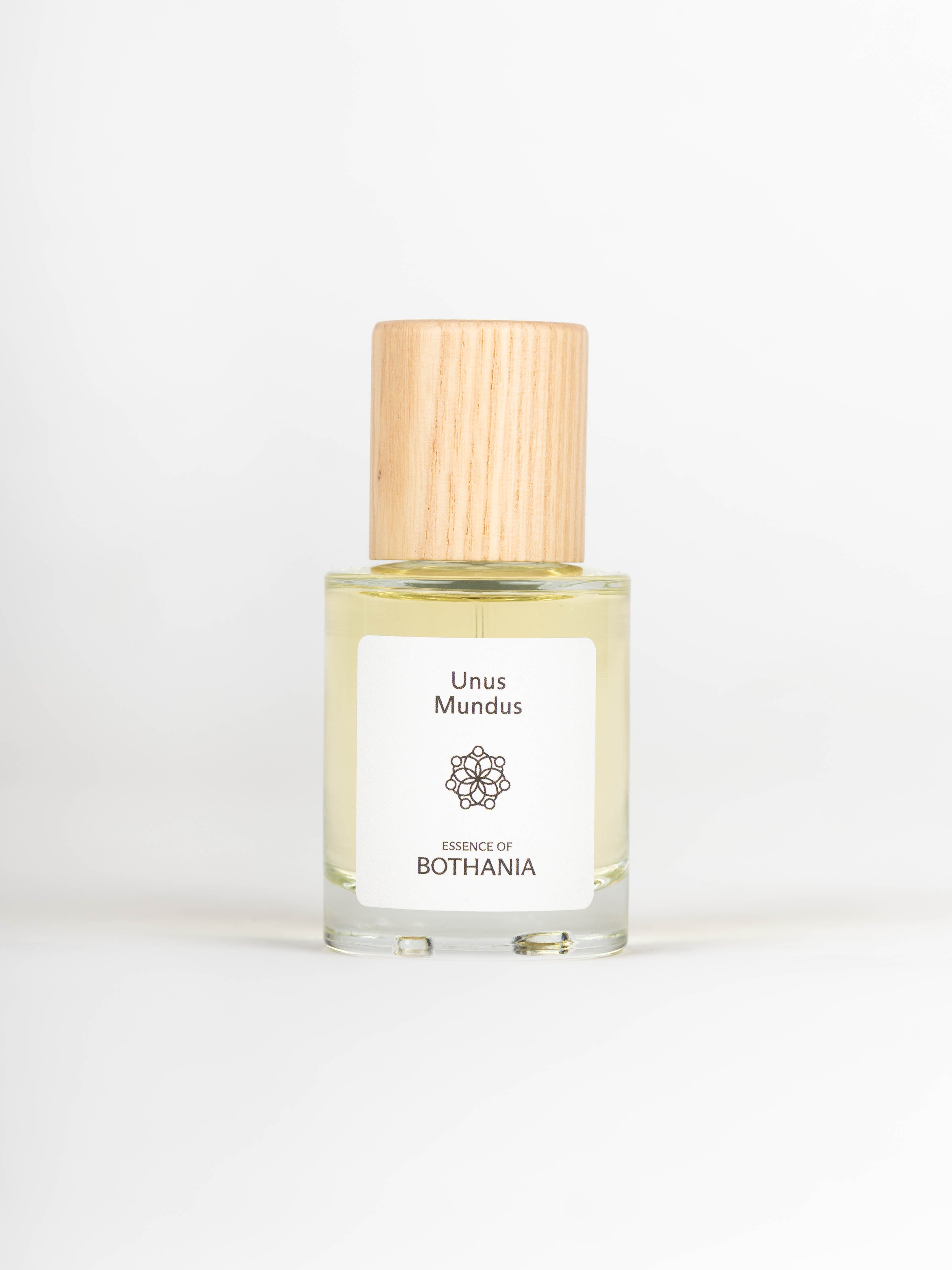 Clear perfume bottle with wooden top named Unus Mundus