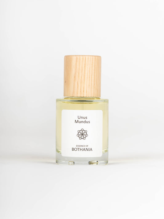 Clear perfume bottle with wooden top named Unus Mundus
